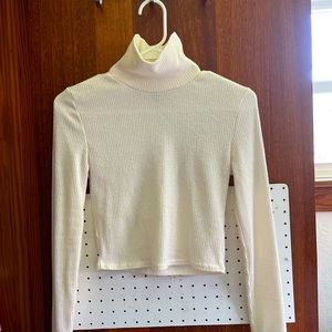 A warm long sleeve turtle neck.